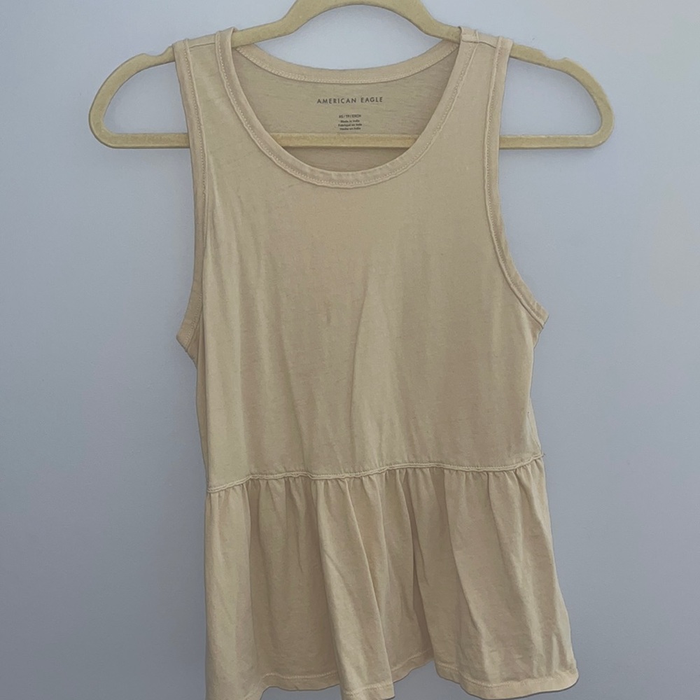 Cream peplum tank